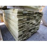 LARGE PACK OF TREATED FEATHER EDGE TIMBER CLADDING BOARDS 1.65M LENGTH X 100MM WIDTH APPROX.