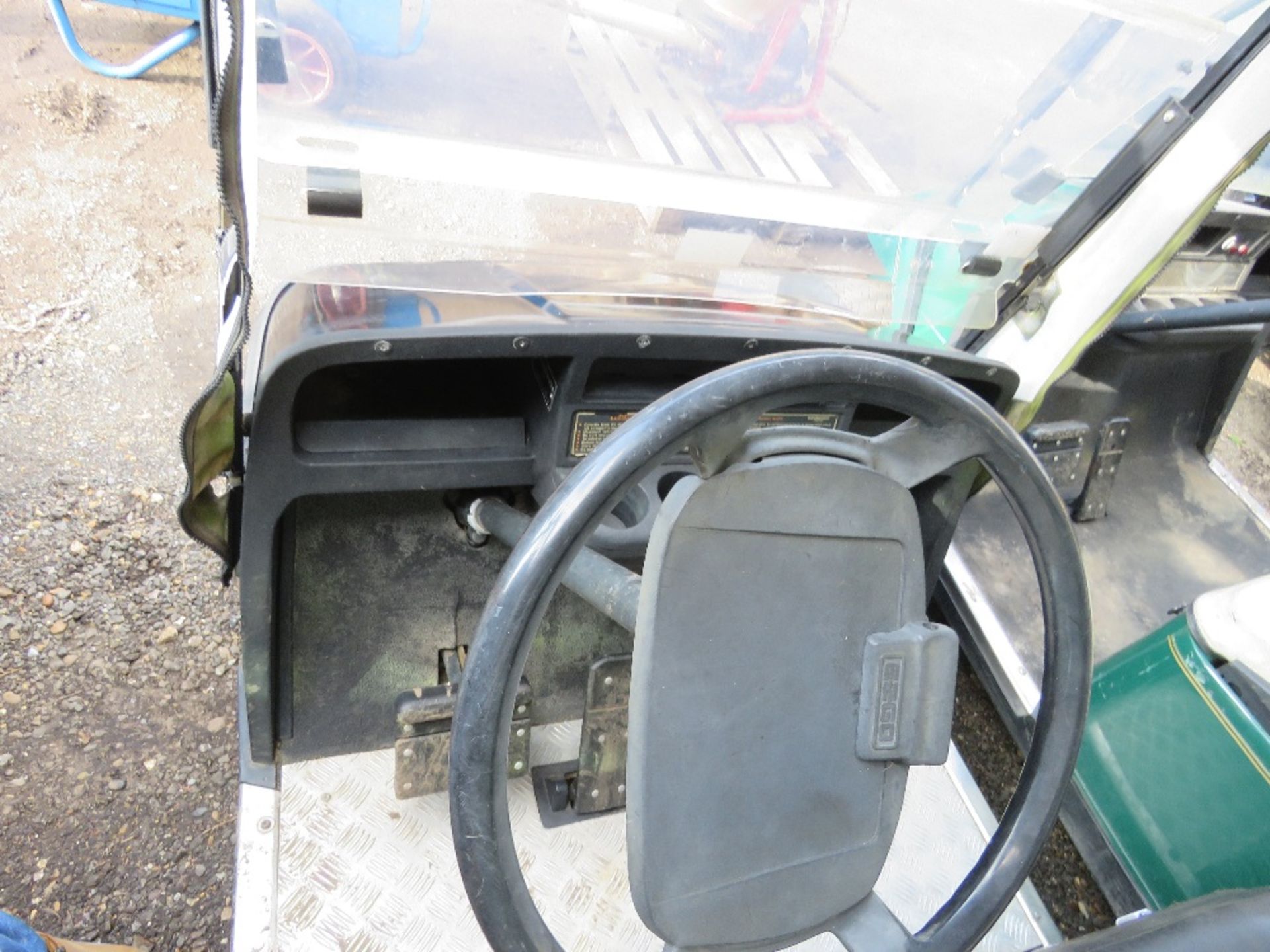 EZGO PETROL ENGINED GOLF BUGGY. BLACK COLOURED. WHEN TESTED WAS SEEN TO RUN, DRIVE, STEER AND BRAKE. - Image 3 of 5