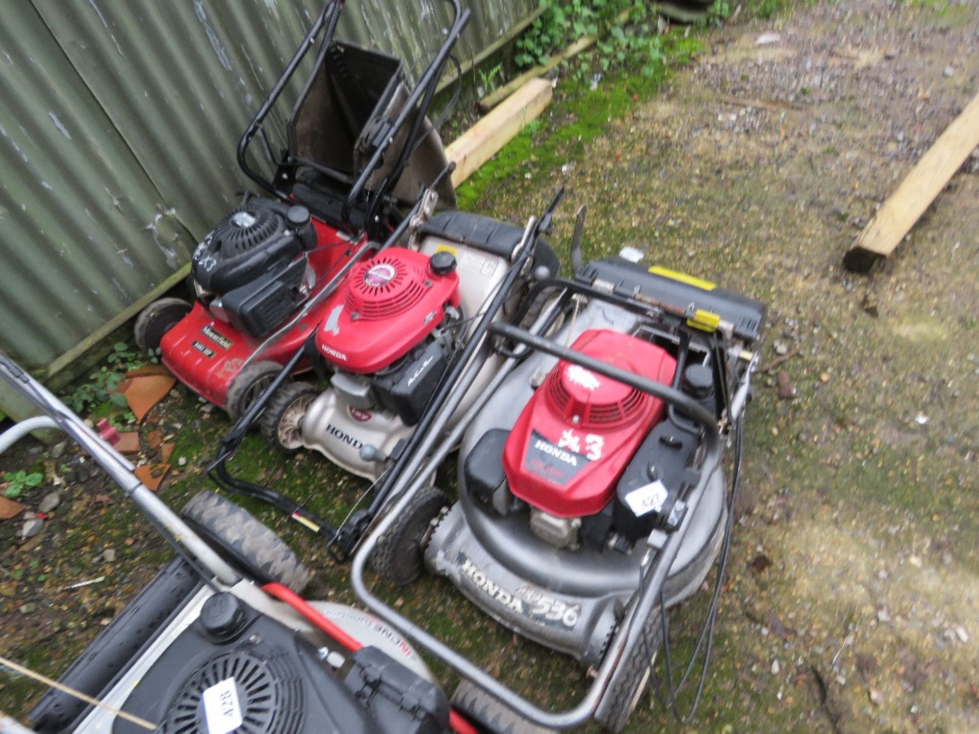 3 X LAWNMOWERS: 2 X HONDA AND A MOUNTFIELD.