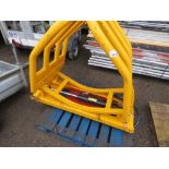 WRAPPED SILAGE BALE SQUEEZE ATTACHMENT FOR LOADER, APPEARS UNUSED.....THIS LOT IS SOLD UNDER THE AUC