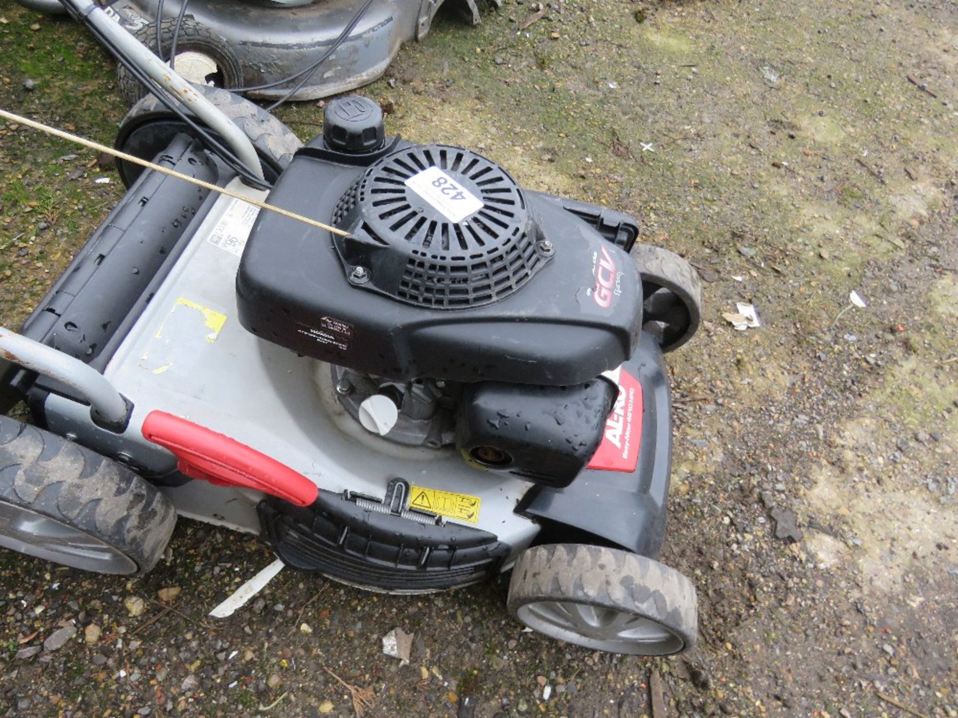 ALKO PETROL ENGINED LAWNMOWER , NO COLLECTOR. THIS LOT IS SOLD UNDER THE AUCTIONEERS MARGIN SCHEME,