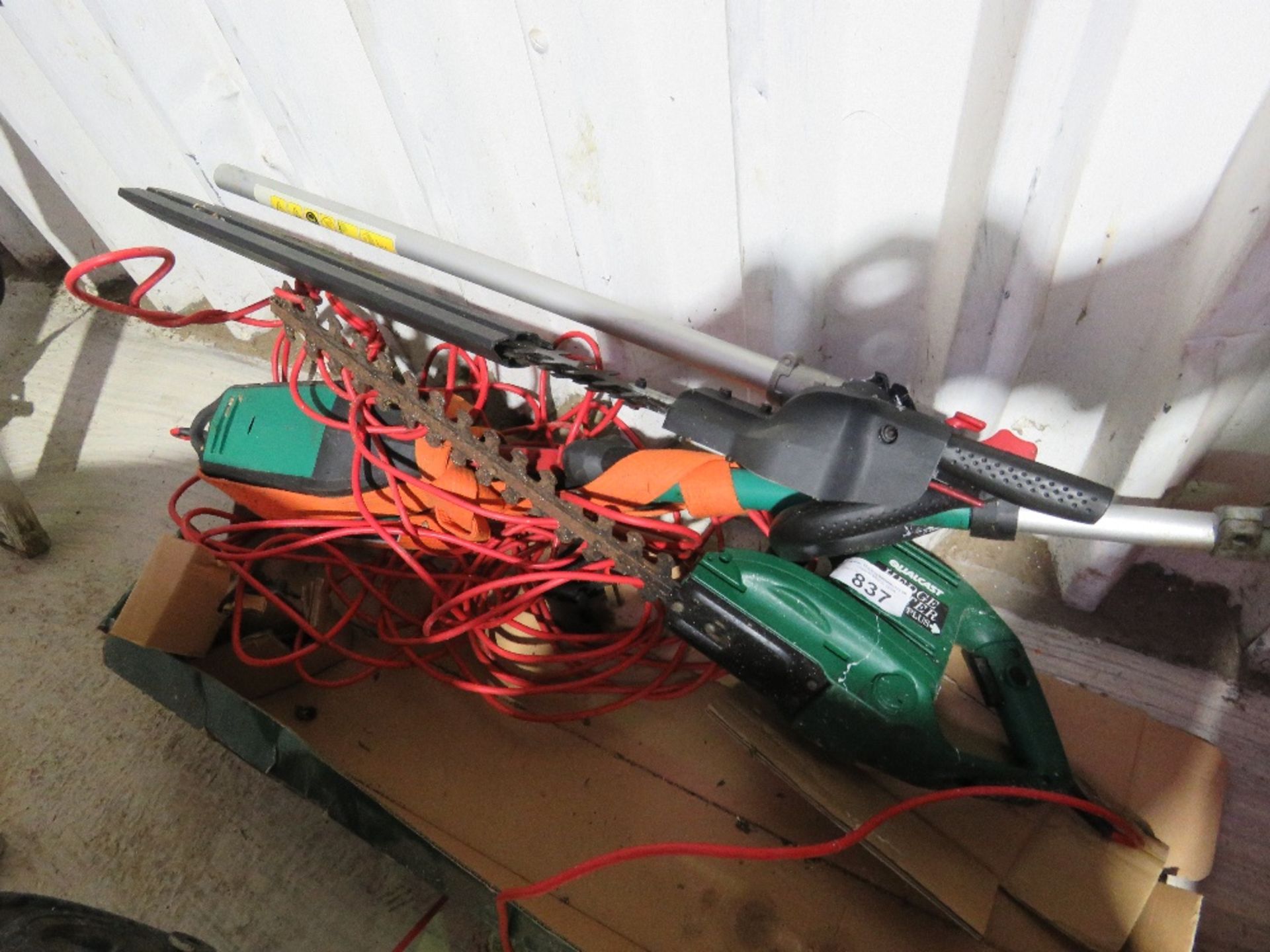 ELECTRIC HEDGE CUTTER AND LONG REACH HEAD.....THIS LOT IS SOLD UNDER THE AUCTIONEERS MARGIN SCHEME,