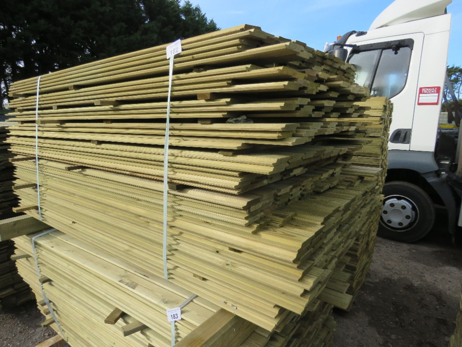 LARGE PACK OF PRESSURE TREATED SHIPLAP TYPE TIMBER CLADDING BOARDS. 1.73-1.93M LENGTH X 100MM WIDTH