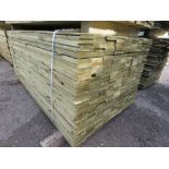 LARGE PACK OF PRESSURE TREATED FEATHER EDGE TIMBER CLADDING BOARDS. 1.80M LENGTH X 100MM WIDTH APPRO