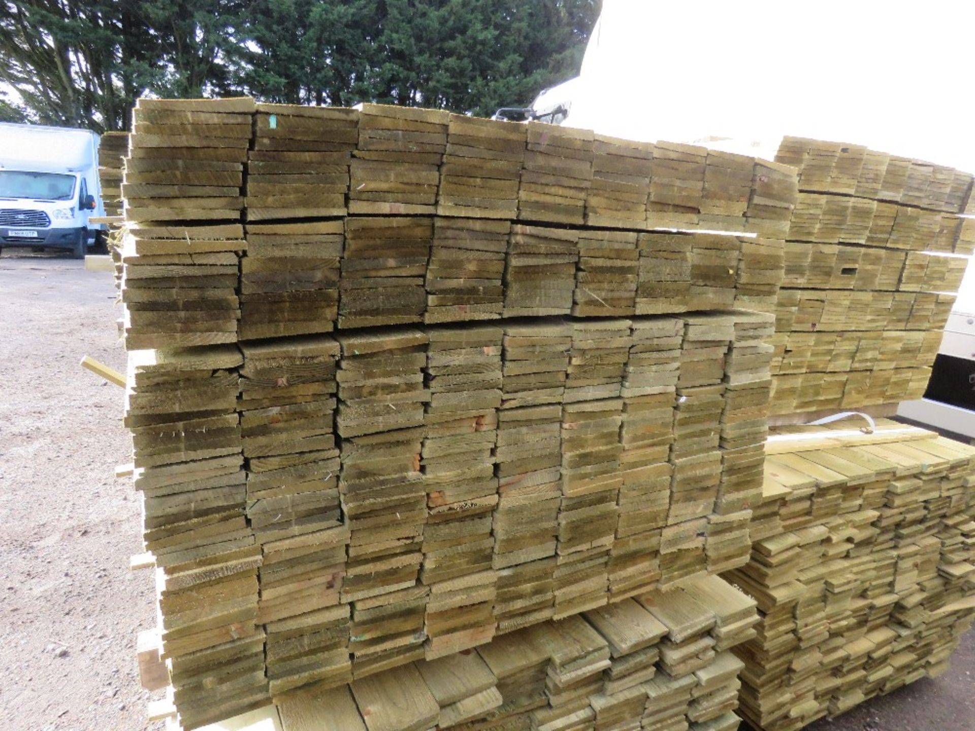 LARGE PACK OF PRESSURE TREATED FEATHER EDGE TIMBER CLADDING BOARDS. 1.80M LENGTH X 100MM WIDTH APPRO - Image 2 of 3