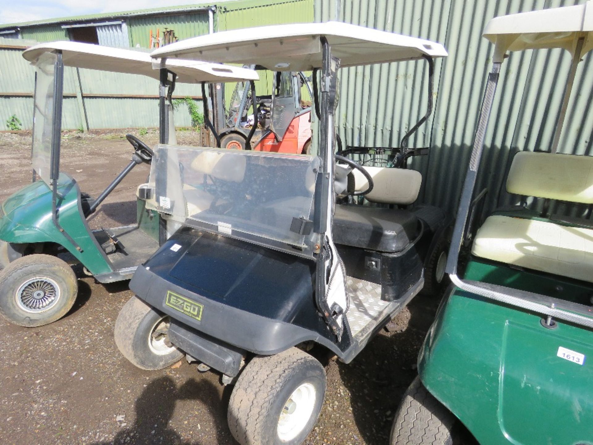 EZGO PETROL ENGINED GOLF BUGGY. BLACK COLOURED. WHEN TESTED WAS SEEN TO RUN, DRIVE, STEER AND BRAKE. - Image 3 of 7