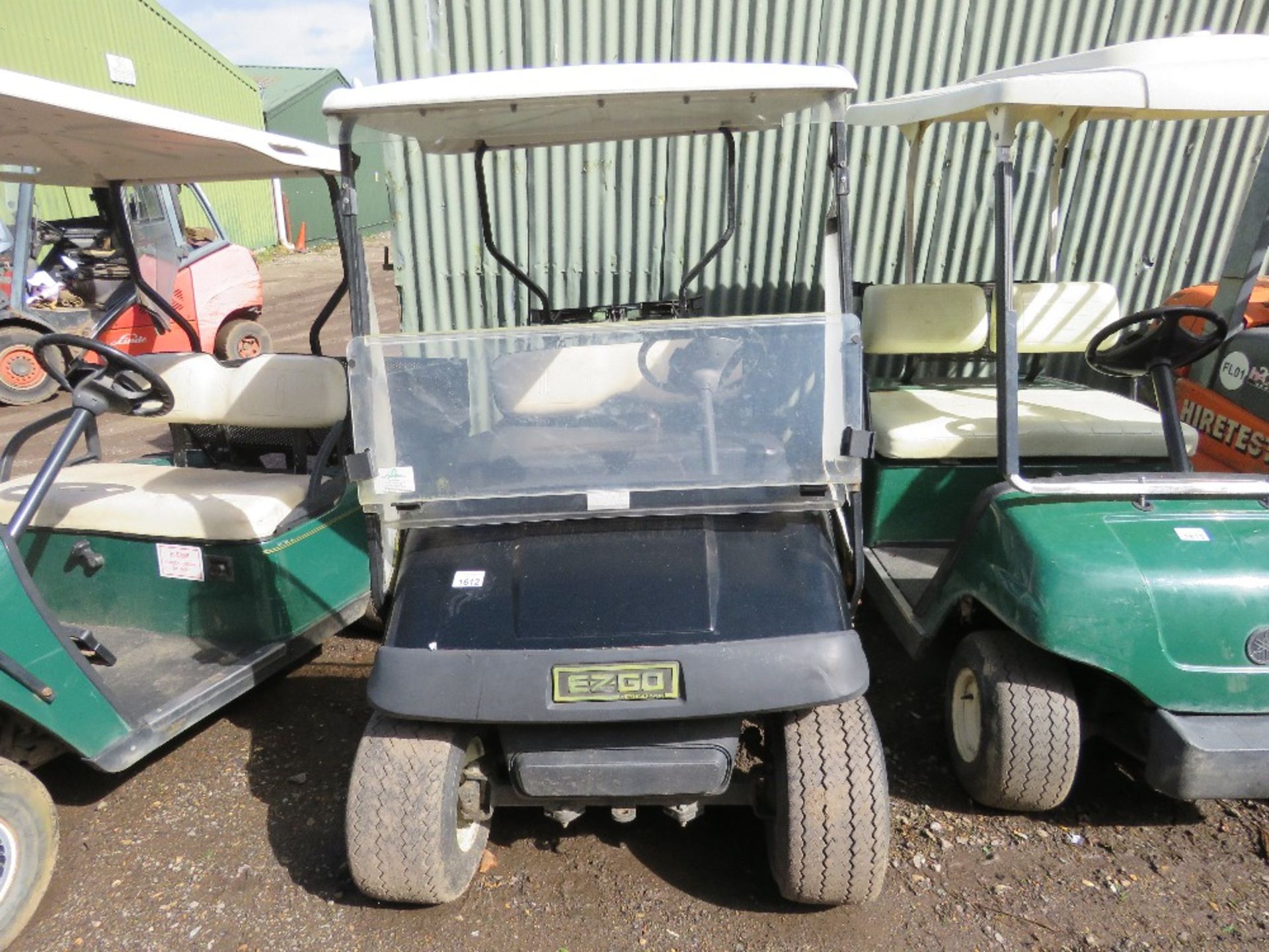 EZGO PETROL ENGINED GOLF BUGGY. BLACK COLOURED. WHEN TESTED WAS SEEN TO RUN, DRIVE, STEER AND BRAKE. - Image 2 of 7