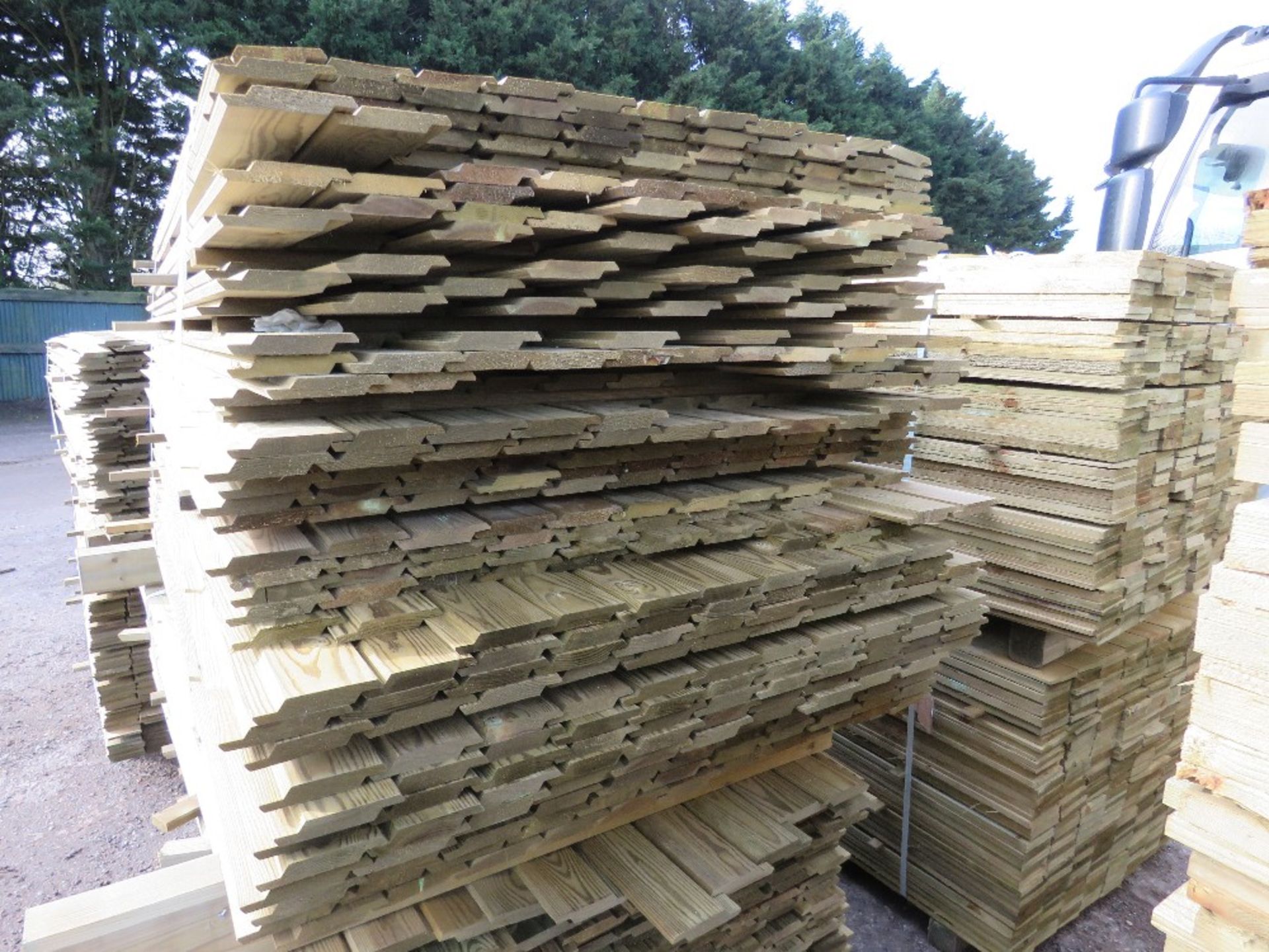 LARGE PACK OF PRESSURE TREATED SHIPLAP TYPE TIMBER CLADDING BOARDS. 1.73-1.93M LENGTH X 100MM WIDTH - Image 2 of 3