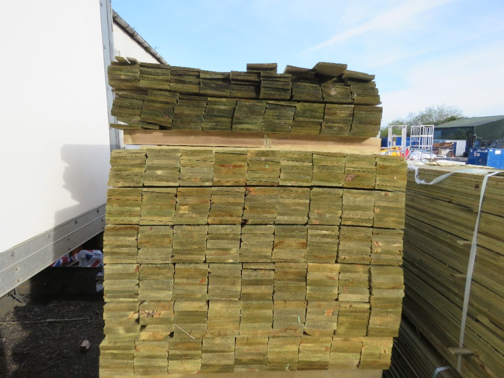 LARGE PACK OF PRESSURE TREATED FEATHER EDGE TIMBER CLADDING BOARDS. 1.5M LENGTH X 100MM WIDTH APPROX - Image 2 of 3