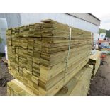 LARGE PACK OF TREATED FEATHER EDGE FENCE CLADDING TIMBER BOARDS. 1.50M LENGTH X 100MM WIDTH APPROX.