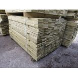 LARGE PACK OF PRESSURE TREATED FEATHER EDGE TIMBER CLADDING BOARDS. 1.50M LENGTH X 100MM WIDTH APPRO