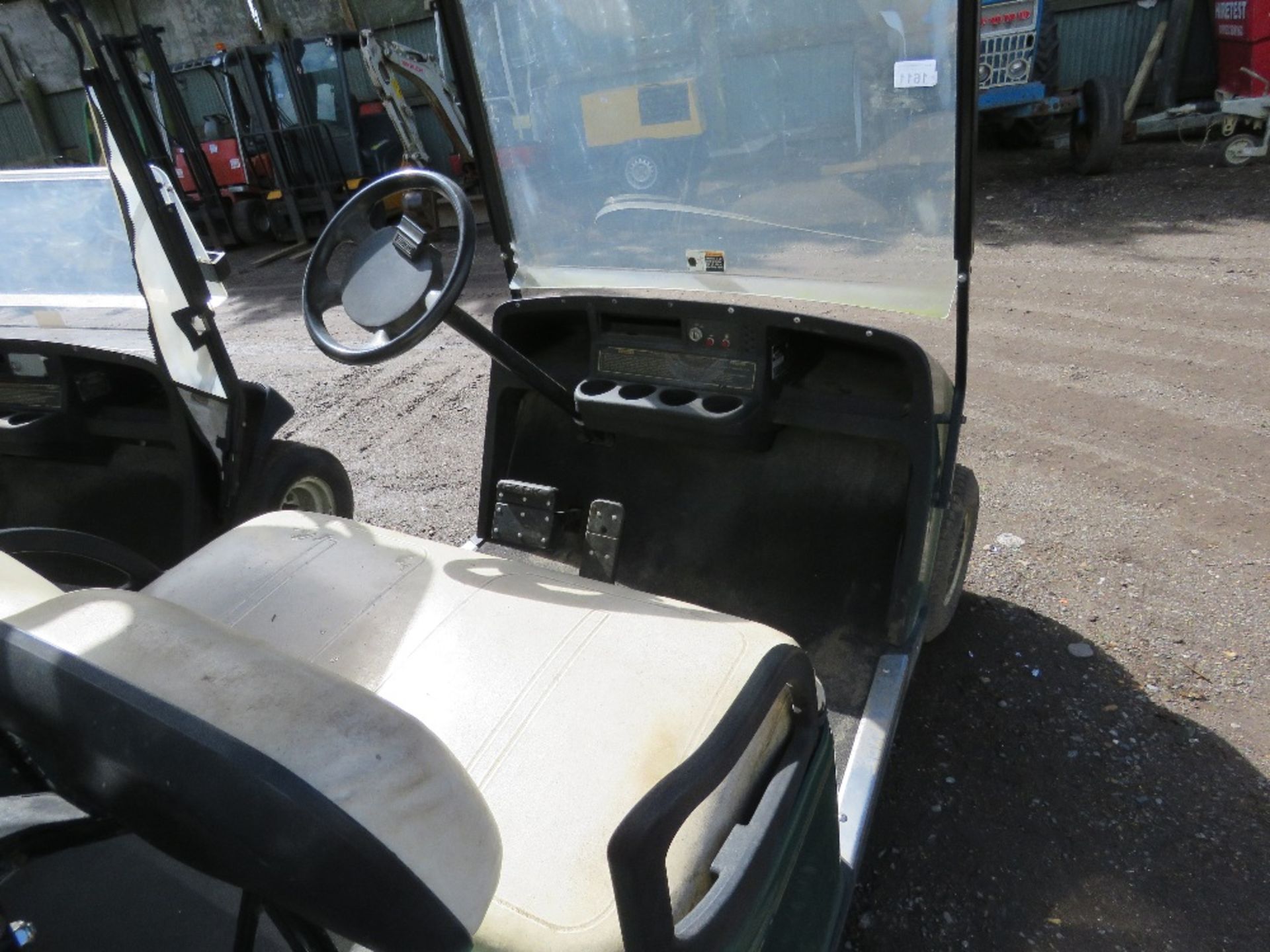 EZGO PETROL ENGINED GOLF BUGGY. GREEN COLOURED. WHEN TESTED WAS SEEN TO RUN, DRIVE, STEER AND BRAKE - Image 5 of 8