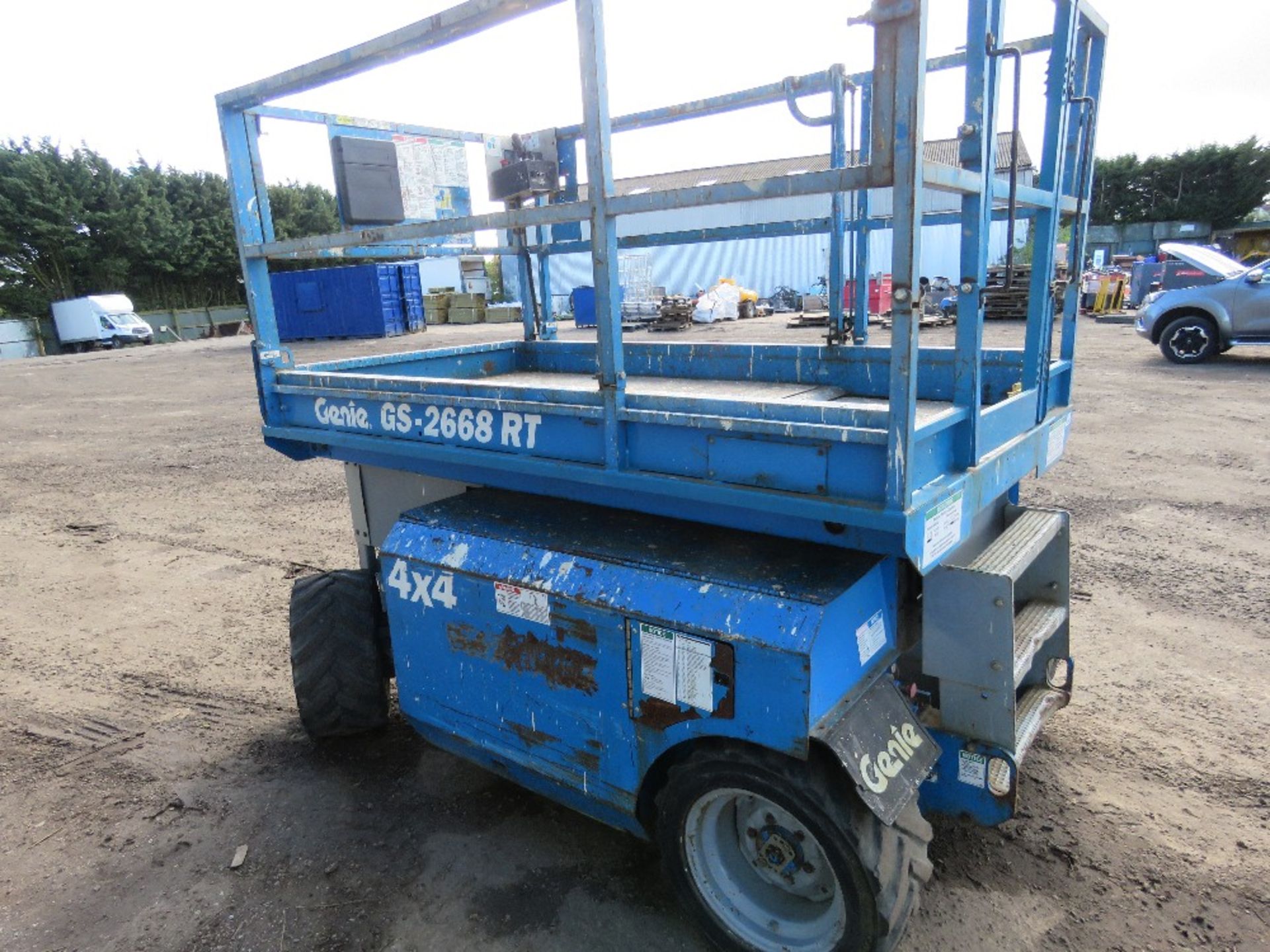 GENIE GS2668RT 4X4 ROUGH TERRAIN SCISSOR LIFT ACCESS UNIT YEAR 2002. SN;GS68-41563. KUBOTA ENGINE.