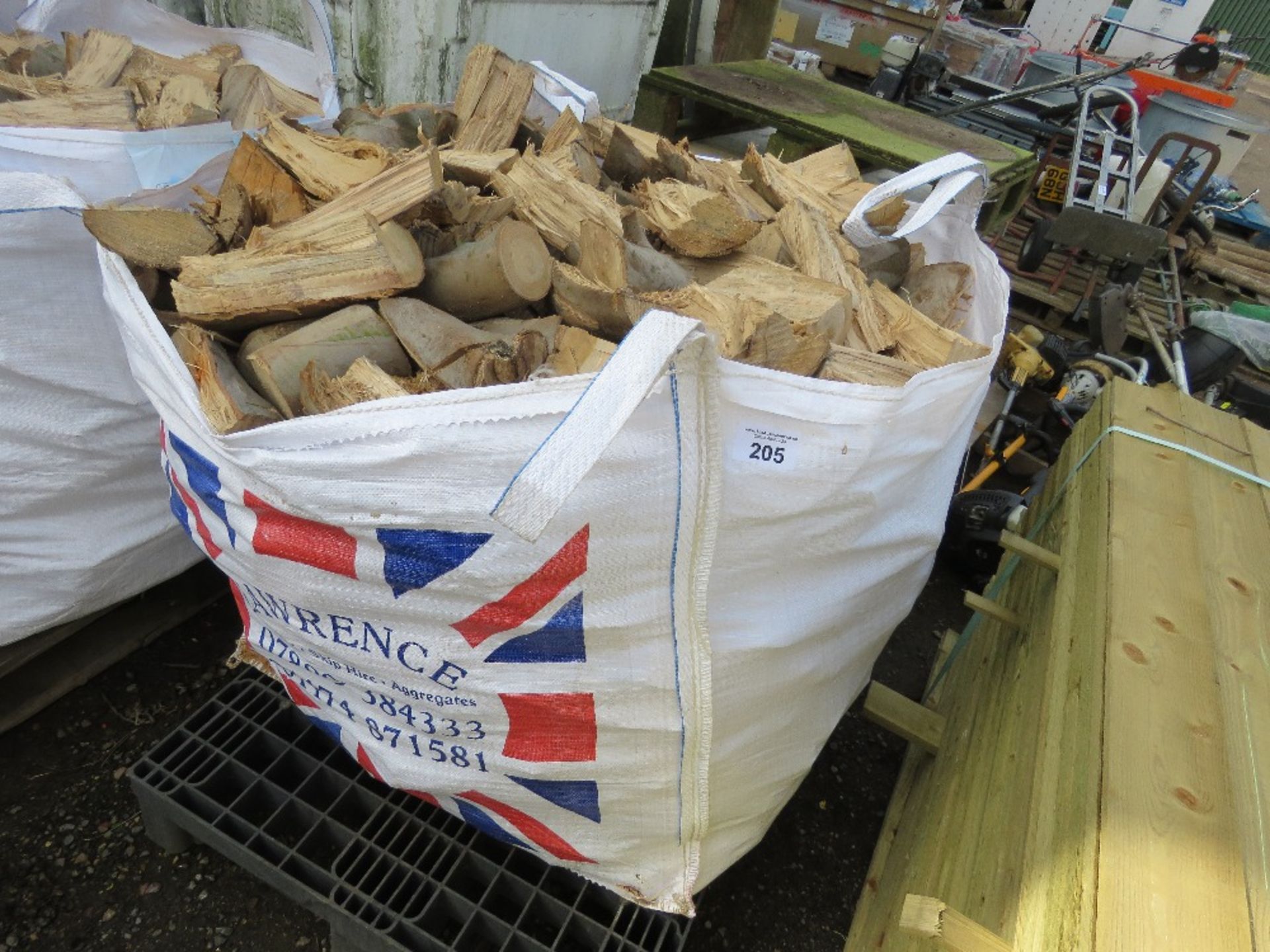 BULK BAG CONTAINING MAINLY HARDWOOD FIREWOOD LOGS.....THIS LOT IS SOLD UNDER THE AUCTIONEERS MARGIN