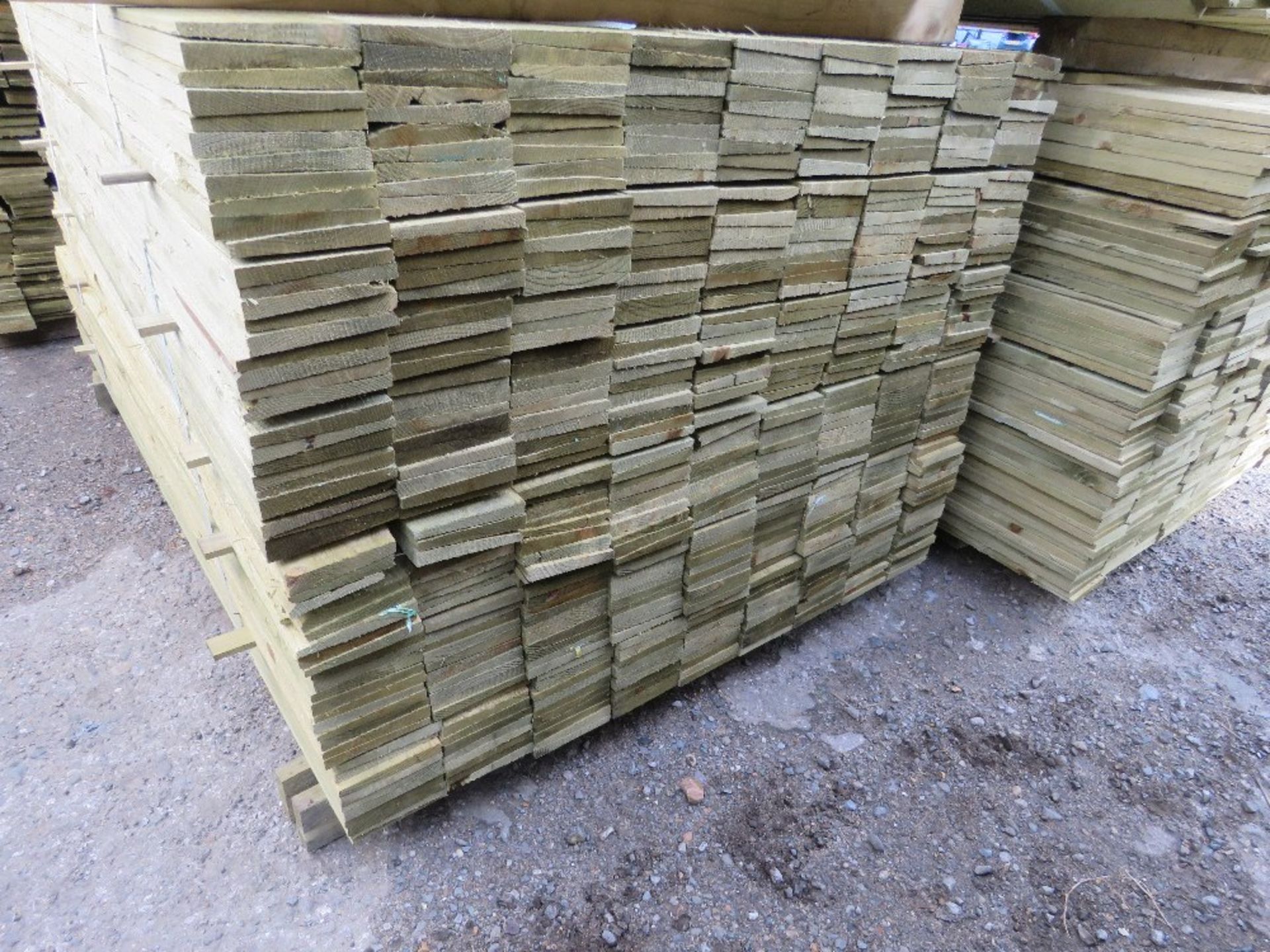 LARGE PACK OF PRESSURE TREATED FEATHER EDGE TIMBER CLADDING BOARDS. 1.50M LENGTH X 100MM WIDTH APPRO - Image 2 of 3