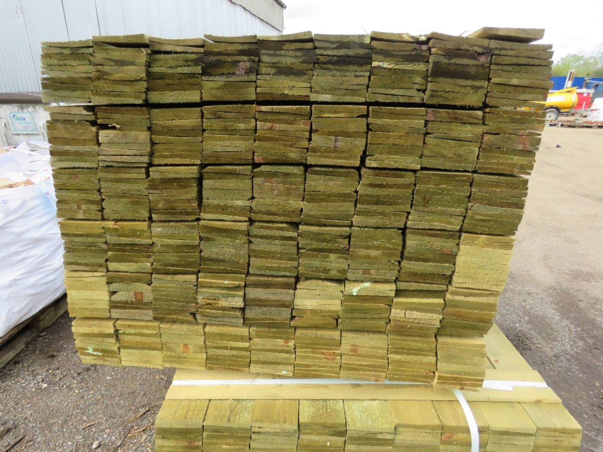 LARGE PACK OF TREATED FEATHER EDGE FENCE CLADDING TIMBER BOARDS. 1.50M LENGTH X 100MM WIDTH APPROX. - Image 2 of 3