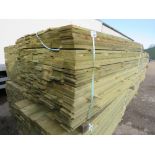 LARGE PACK OF PRESSURE TREATED FEATHER EDGE TIMBER CLADDING BOARDS. 1.65M LENGTH X 100MM WIDTH APPRO