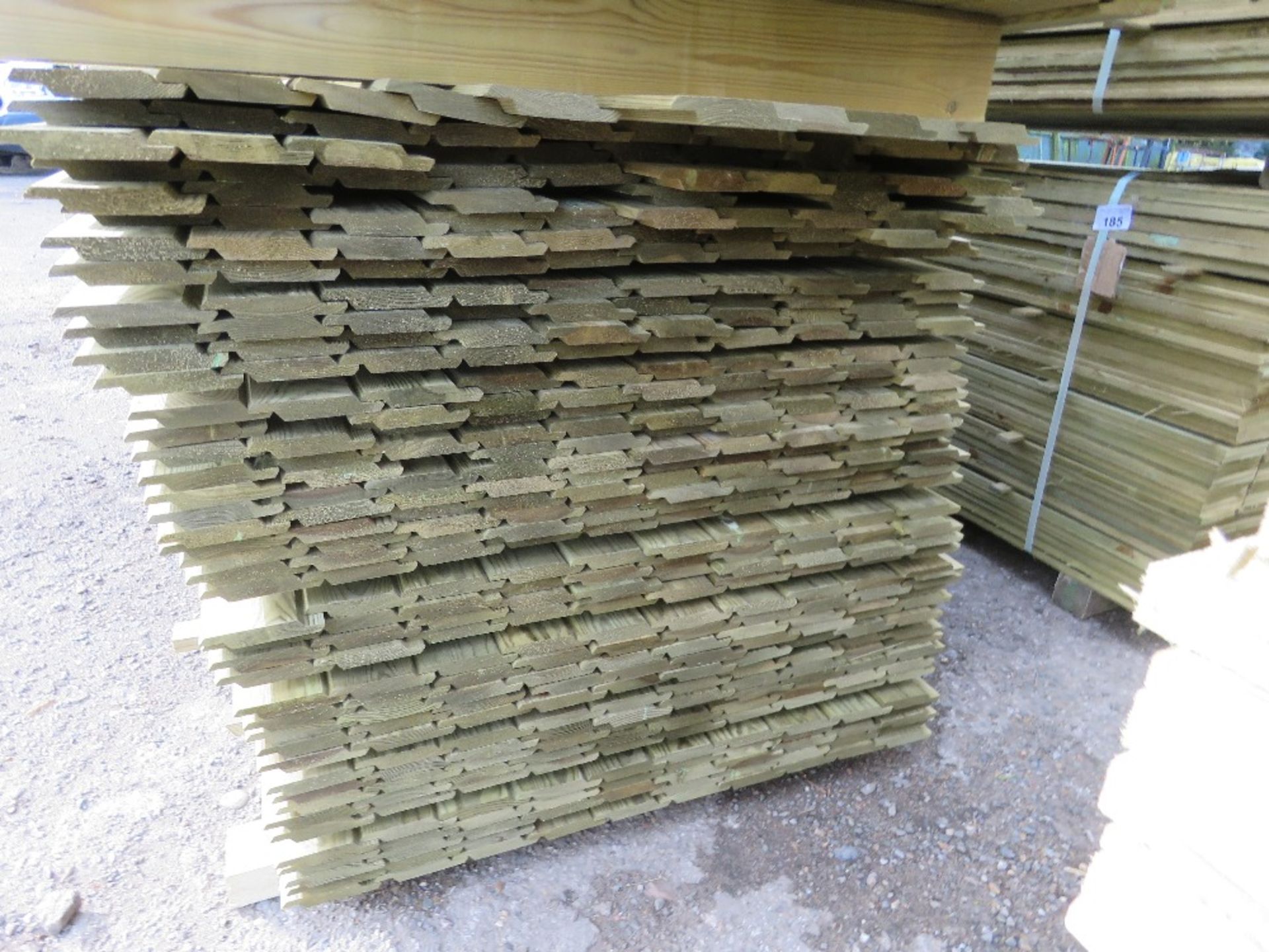 LARGE PACK OF PRESSURE TREATED SHIPLAP TYPE TIMBER CLADDING BOARDS. 1.73-1.93M LENGTH X 100MM WIDTH - Image 2 of 3