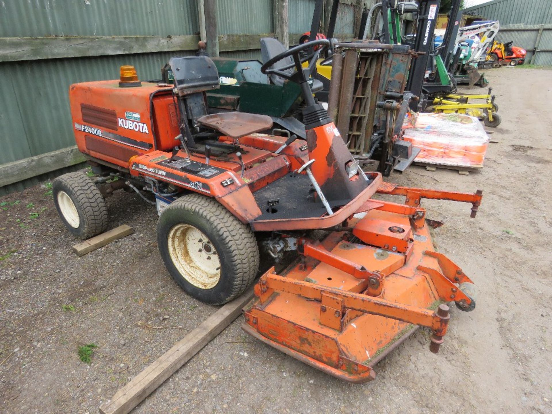 KUBOTA F2400B RIDE ON ROTARY MOWER, 4WD. WHEN TESTED WAS SEEN TO RUN, DRIVE AND MOWER ENGAGED...SEE