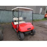 EZGO BATTERY POWERED GOLF BUGGY WITH CAHRGER AND KEY (NOT CHARGED...UNTESTED)....THIS LOT IS SOLD UN