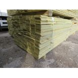 LARGE PACK OF PRESSURE TREATED FEATHER EDGE TIMBER CLADDING BOARDS. 1.80M LENGTH X 100MM WIDTH APPRO