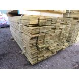 LARGE PACK OF PRESSURE TREATED FEATHER EDGE TIMBER CLADDING BOARDS. 1.80M LENGTH X 100MM WIDTH APPRO