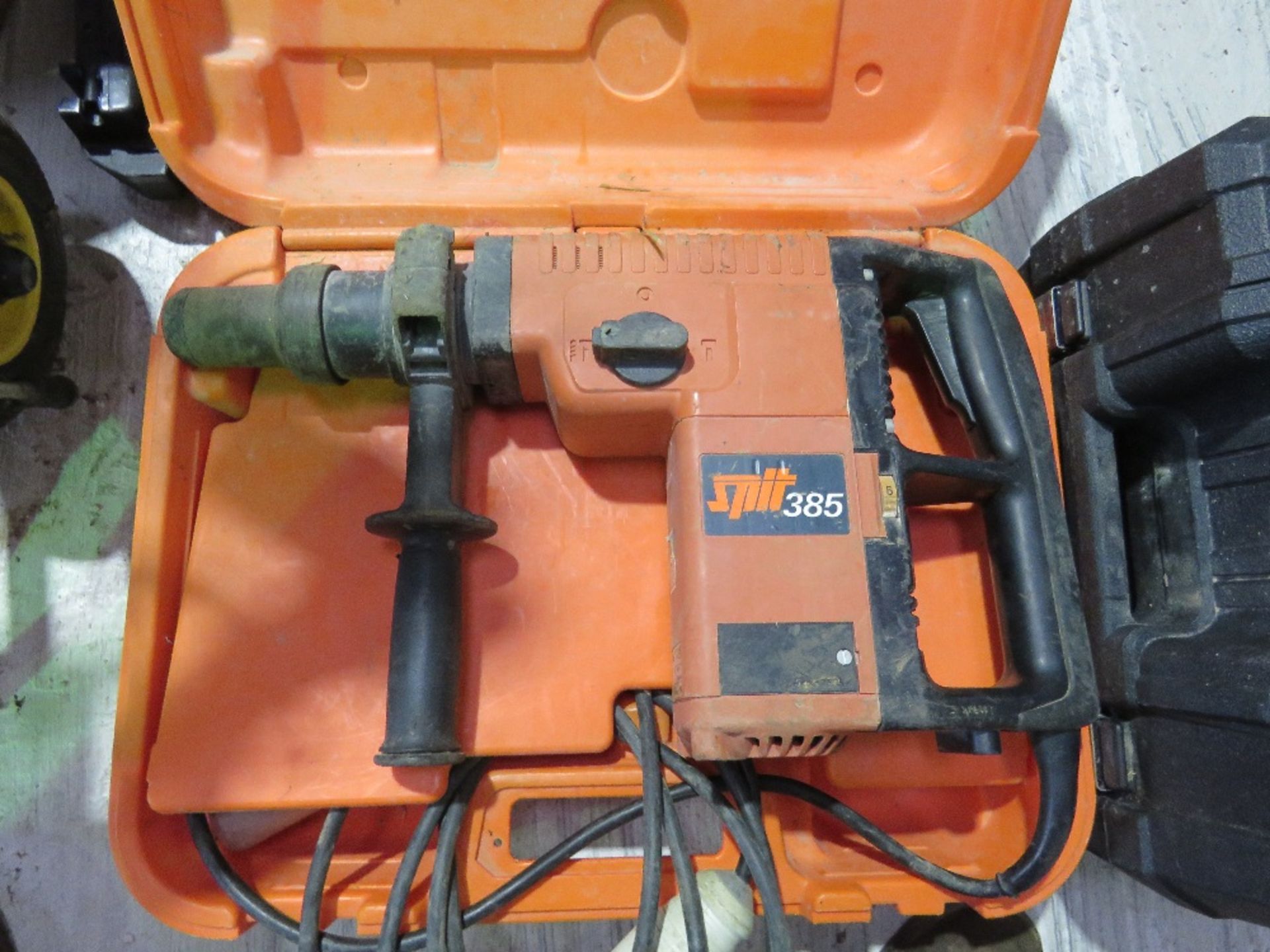 SPIT 385 BREAKER DRILL IN A CASE, 110VOLT POWERED.....THIS LOT IS SOLD UNDER THE AUCTIONEERS MARGIN