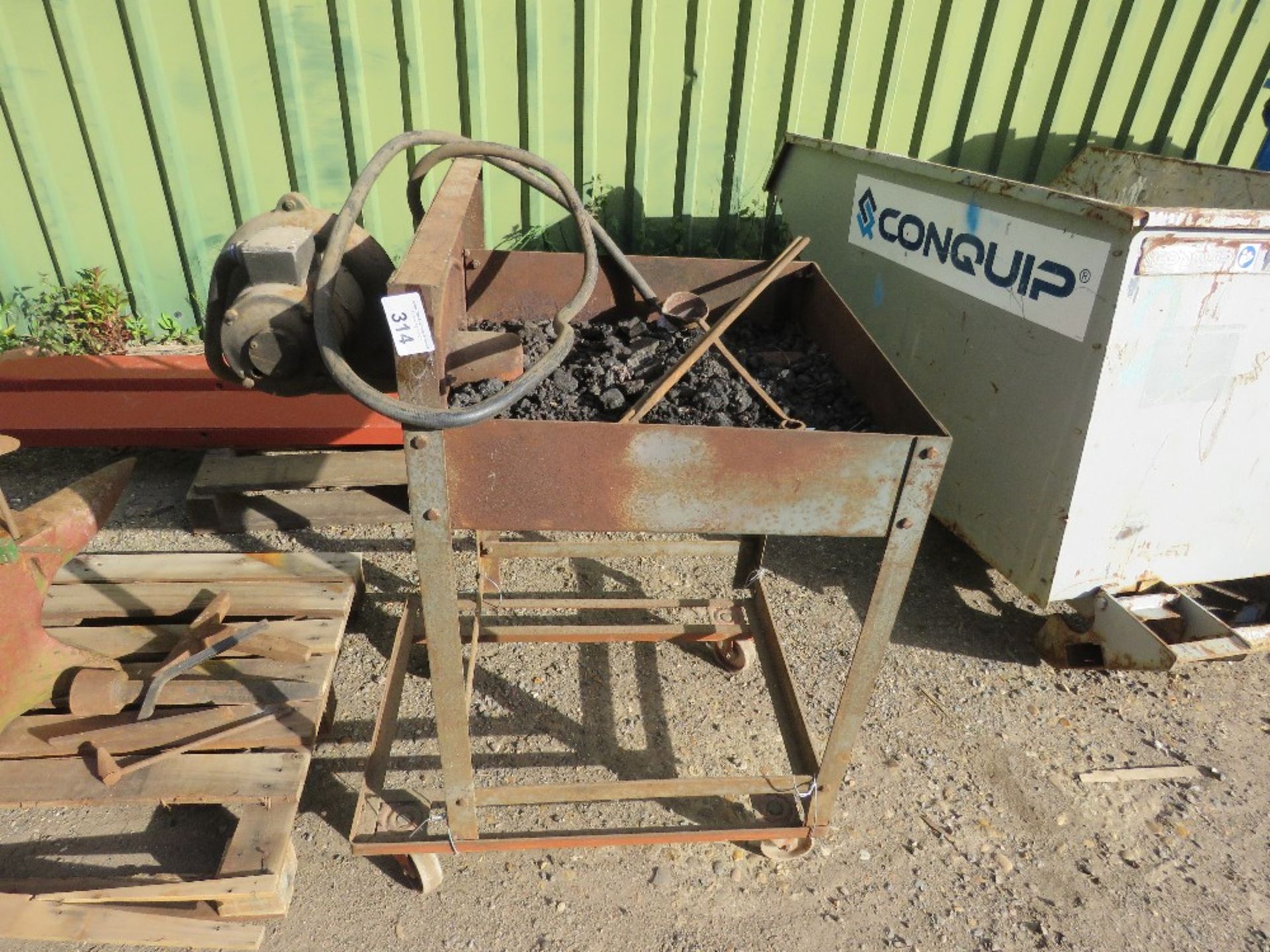 BLACKSMITH'S FORGE, 240VOLT POWERED PLUS TONGS AND LADDLE AS SHOWN.....THIS LOT IS SOLD UNDER THE AU