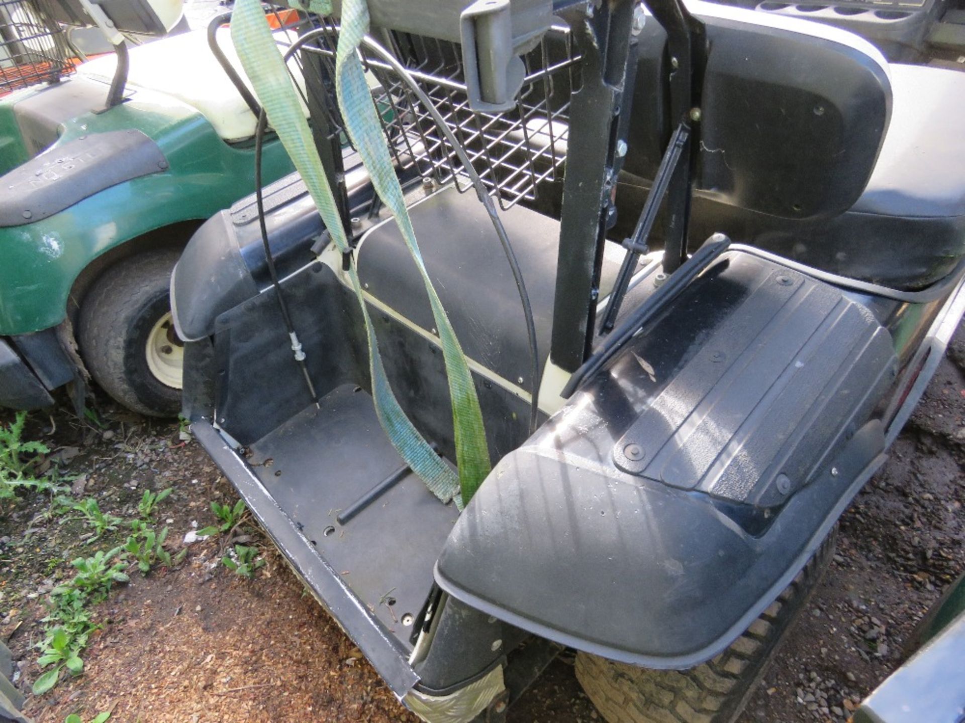 EZGO PETROL ENGINED GOLF BUGGY. BLACK COLOURED. WHEN TESTED WAS SEEN TO RUN, DRIVE, STEER AND BRAKE. - Image 4 of 7