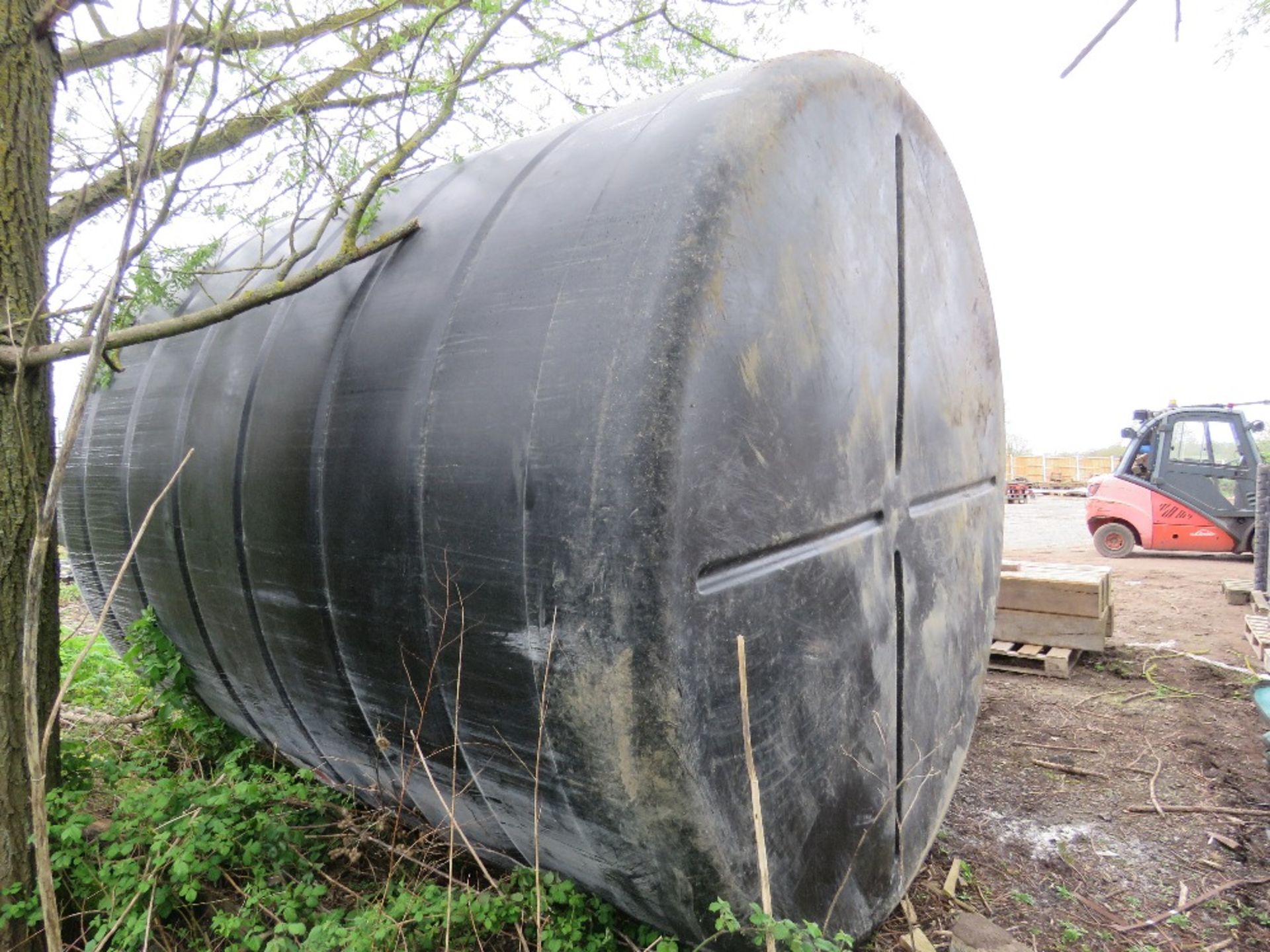 EXTRA LARGE WATER STORAGE TANK 10FT HEIGHT X 9FT DIAMETER APPROX. DAMAGED IN THE MIDDLE AS SHOWN. EX - Image 2 of 10