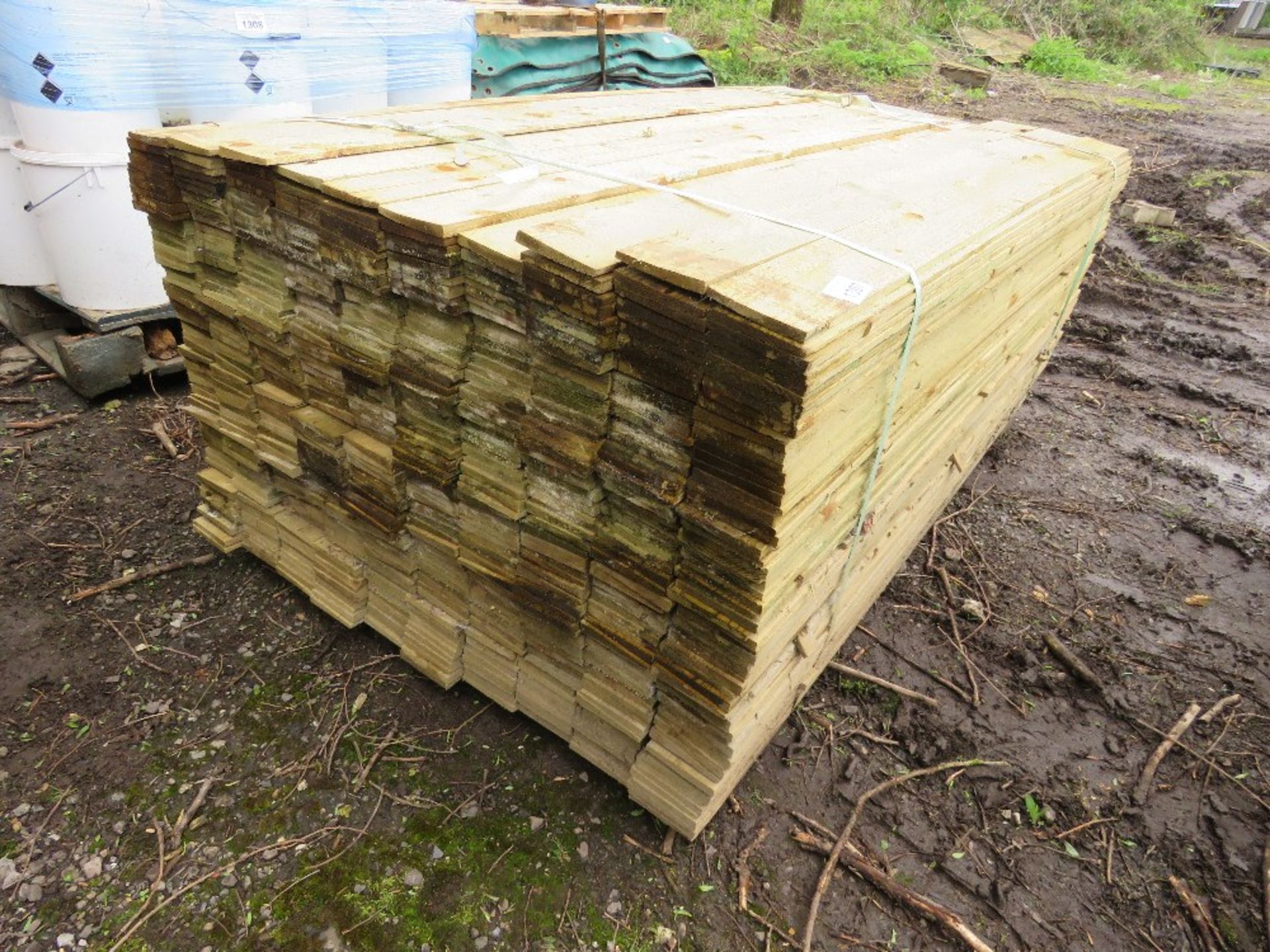LARGE PACK OF PRESSURE TREATED FEATHER EDGE CLADDING TIMBER 1.8M LENGTH X 100MM WIDTH APPROX.