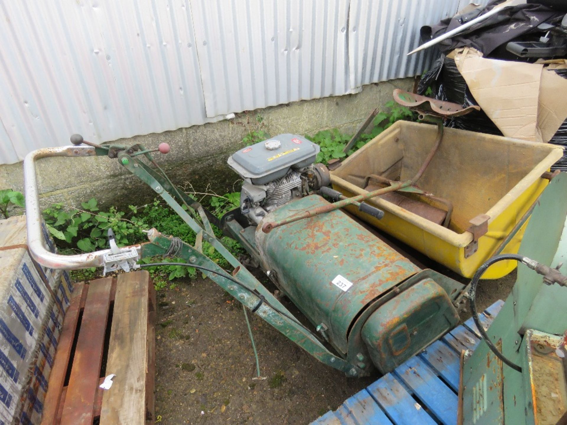 LARGE CYLINDER MOWER WITH SEAT AND COLLECTOR. KUBOTA GS300 ENGINE FITTED.