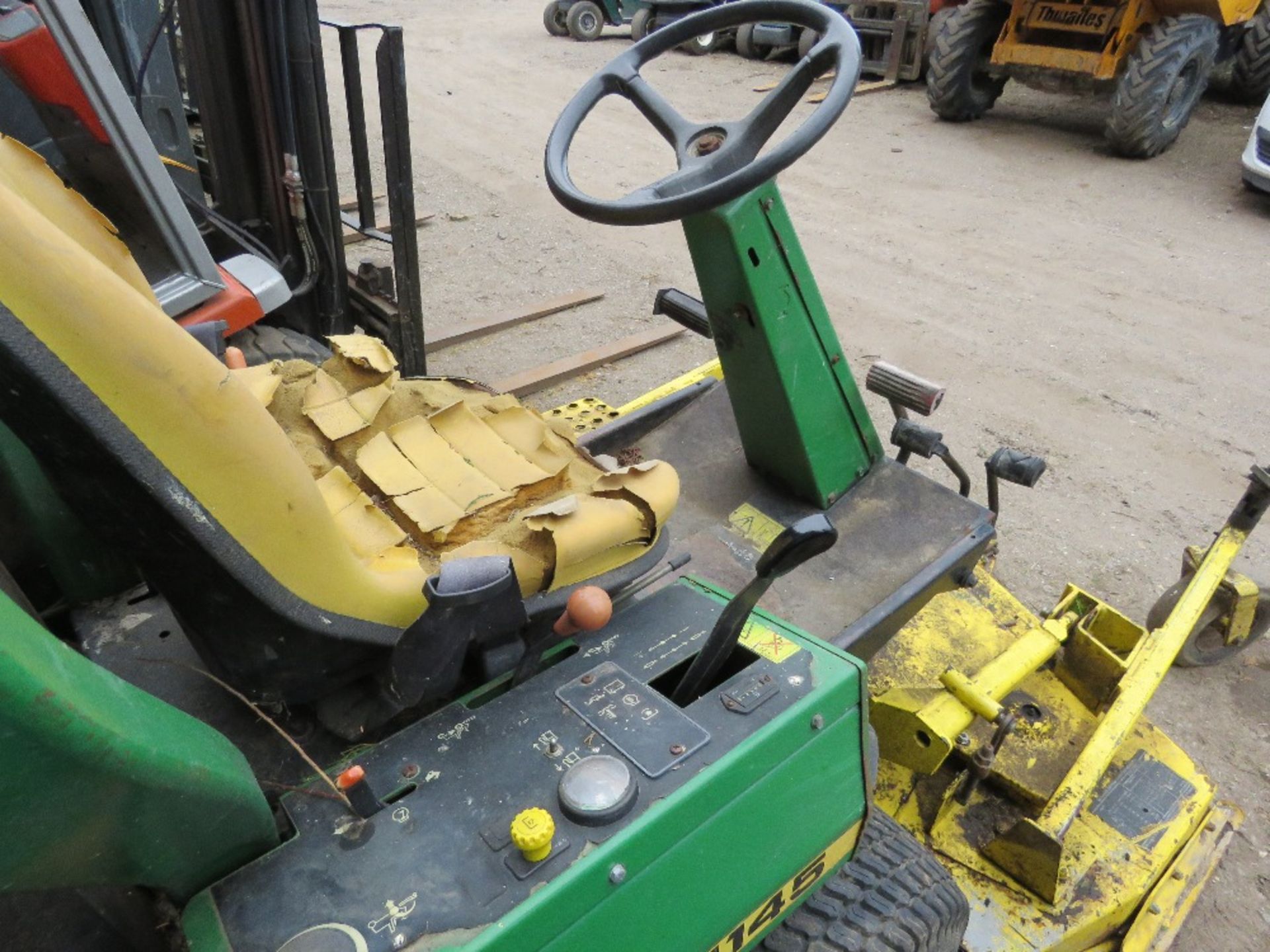 JOHN DEERE 1145 4WD OUT FRONT ROTARY MOWER. WHEN TESTED WAS SEEN TO START, RUN, DRIVE AND MOWER ENGA - Image 7 of 11