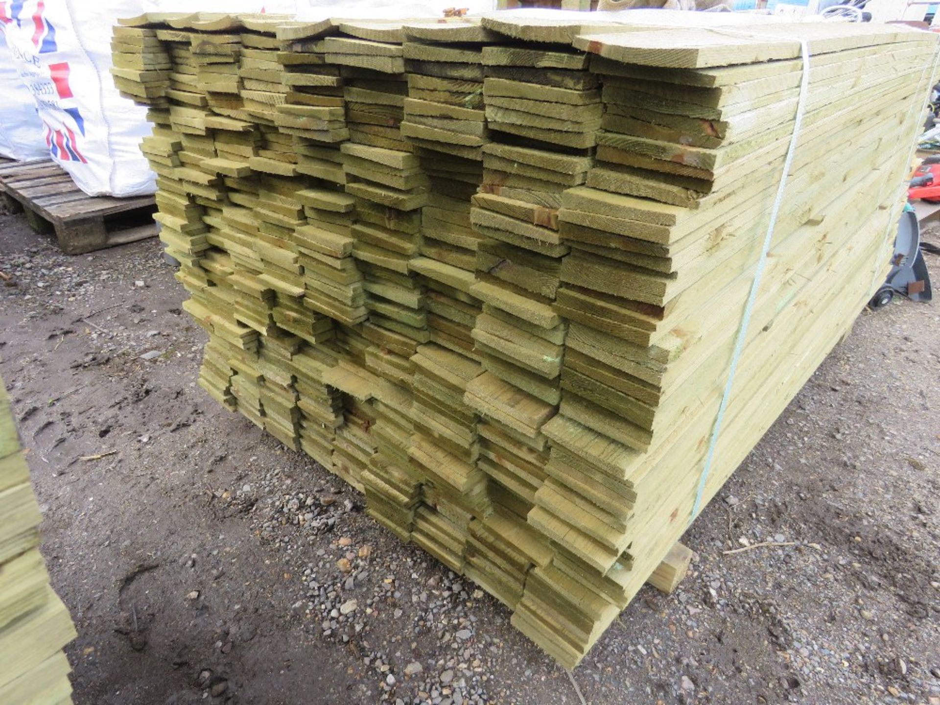 LARGE PACK OF TREATED FEATHER EDGE FENCE CLADDING TIMBER BOARDS. 1.65M LENGTH X 100MM WIDTH APPROX. - Image 2 of 3