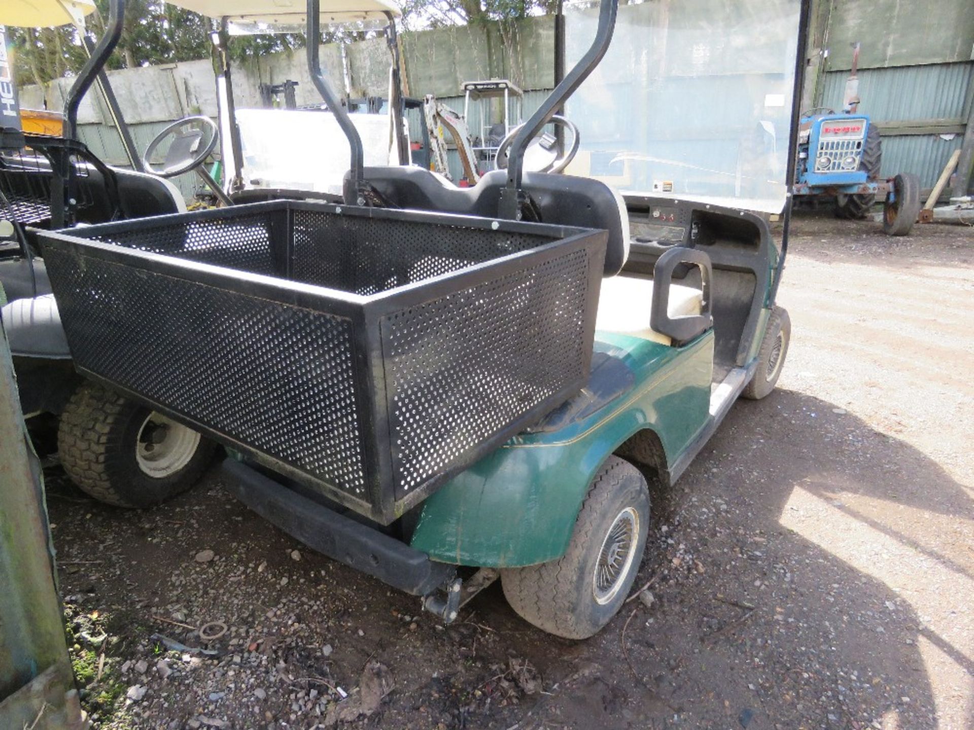 EZGO PETROL ENGINED GOLF BUGGY. GREEN COLOURED. WHEN TESTED WAS SEEN TO RUN, DRIVE, STEER AND BRAKE - Image 4 of 8