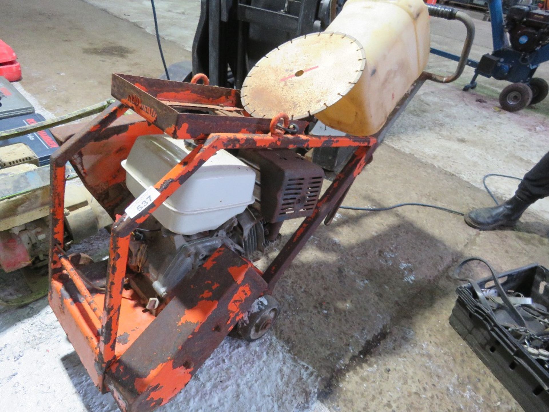 REDBAND FLOOR SAW WITH BLADE AND WATER TANK....SOURCED FROM DEPOT CLOSURE.