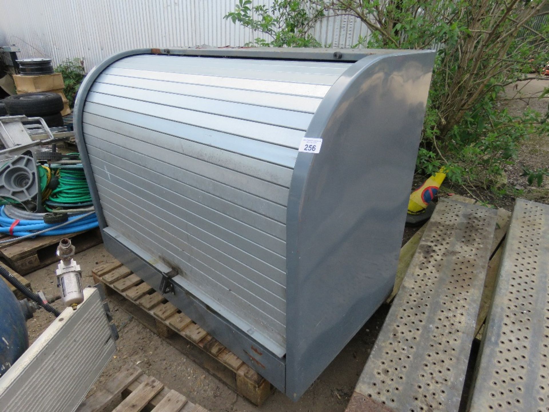 STORAGE CABINET, 5FT WIDTH APPROX WITH ROLLER SHUTTER FRONT.