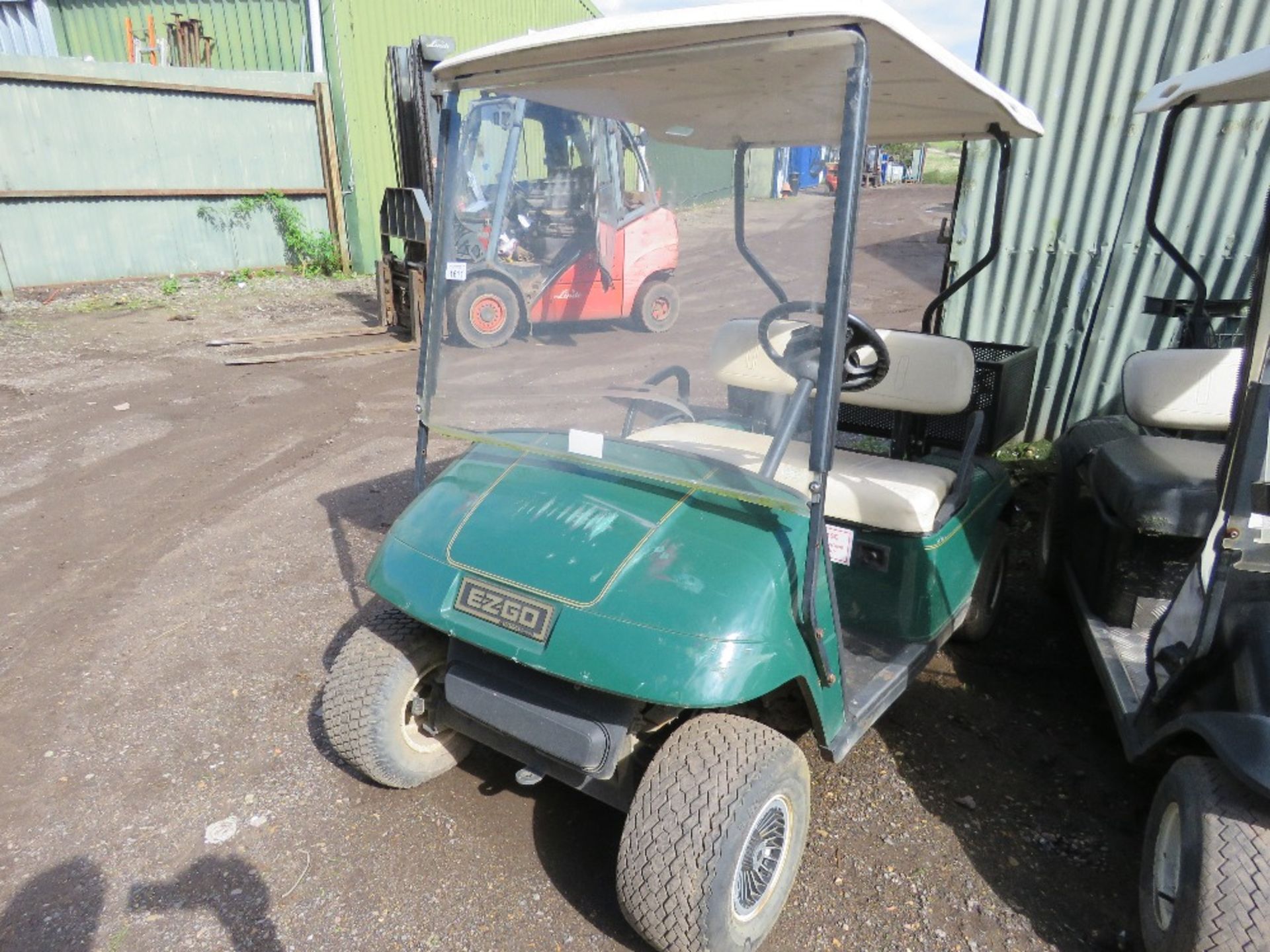 EZGO PETROL ENGINED GOLF BUGGY. GREEN COLOURED. WHEN TESTED WAS SEEN TO RUN, DRIVE, STEER AND BRAKE - Image 3 of 8