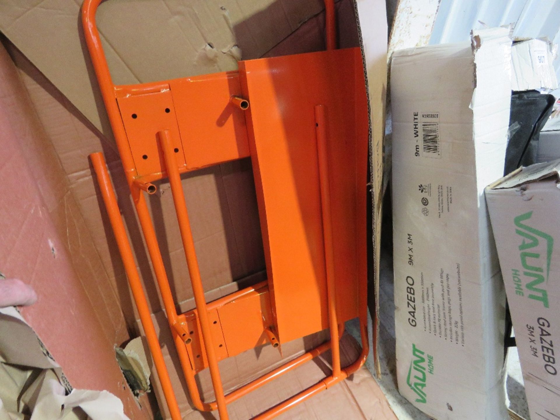 HEAVY DUTY BOARD CARRYING TROLLEY IN A BOX, CONDITION UNKNOWN.