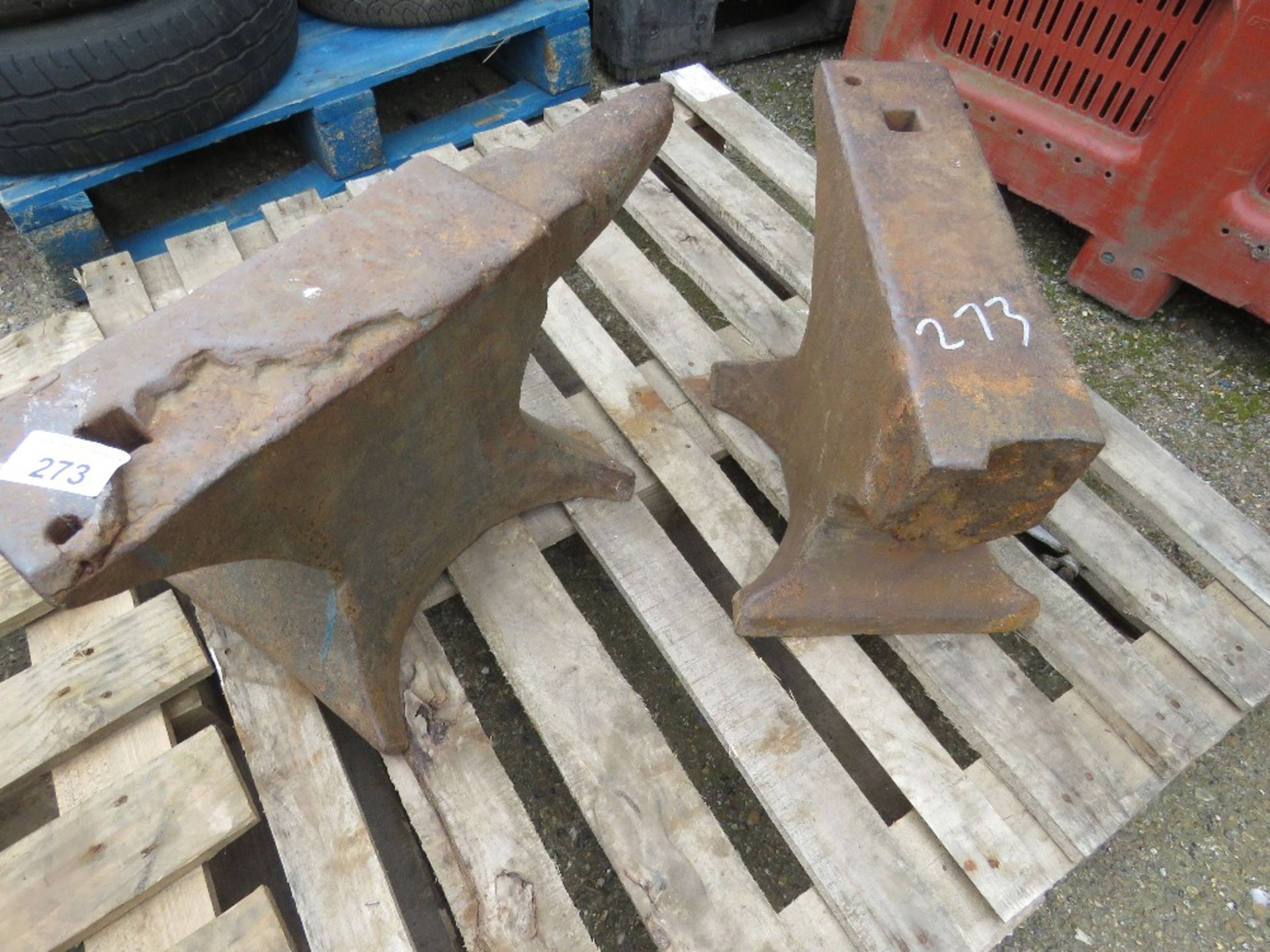 LARGE BLACKSMITH'S ANVIL PLUS ANOTHER DAMAGED ONE.