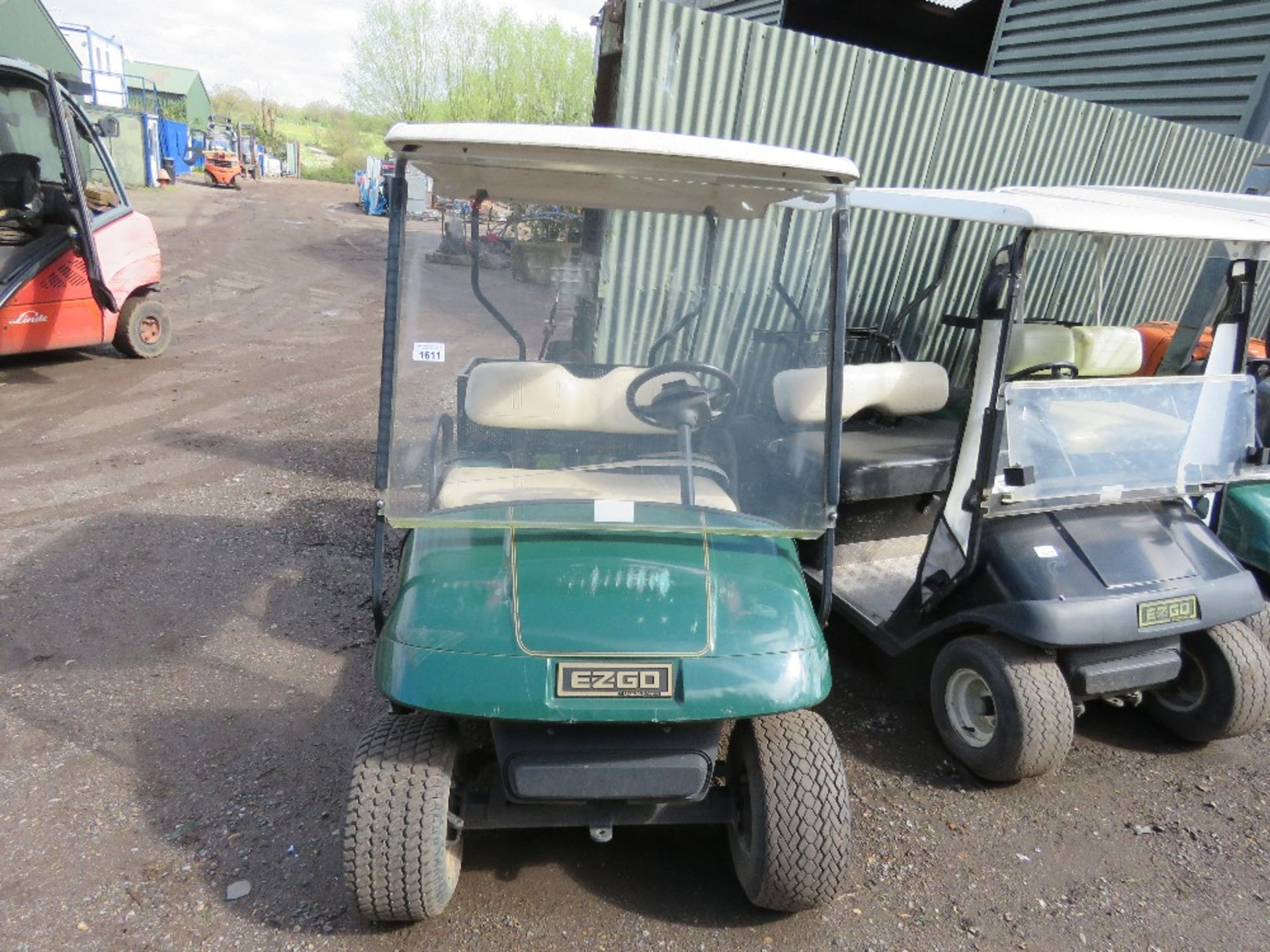 EZGO PETROL ENGINED GOLF BUGGY. GREEN COLOURED. WHEN TESTED WAS SEEN TO RUN, DRIVE, STEER AND BRAKE - Image 2 of 8