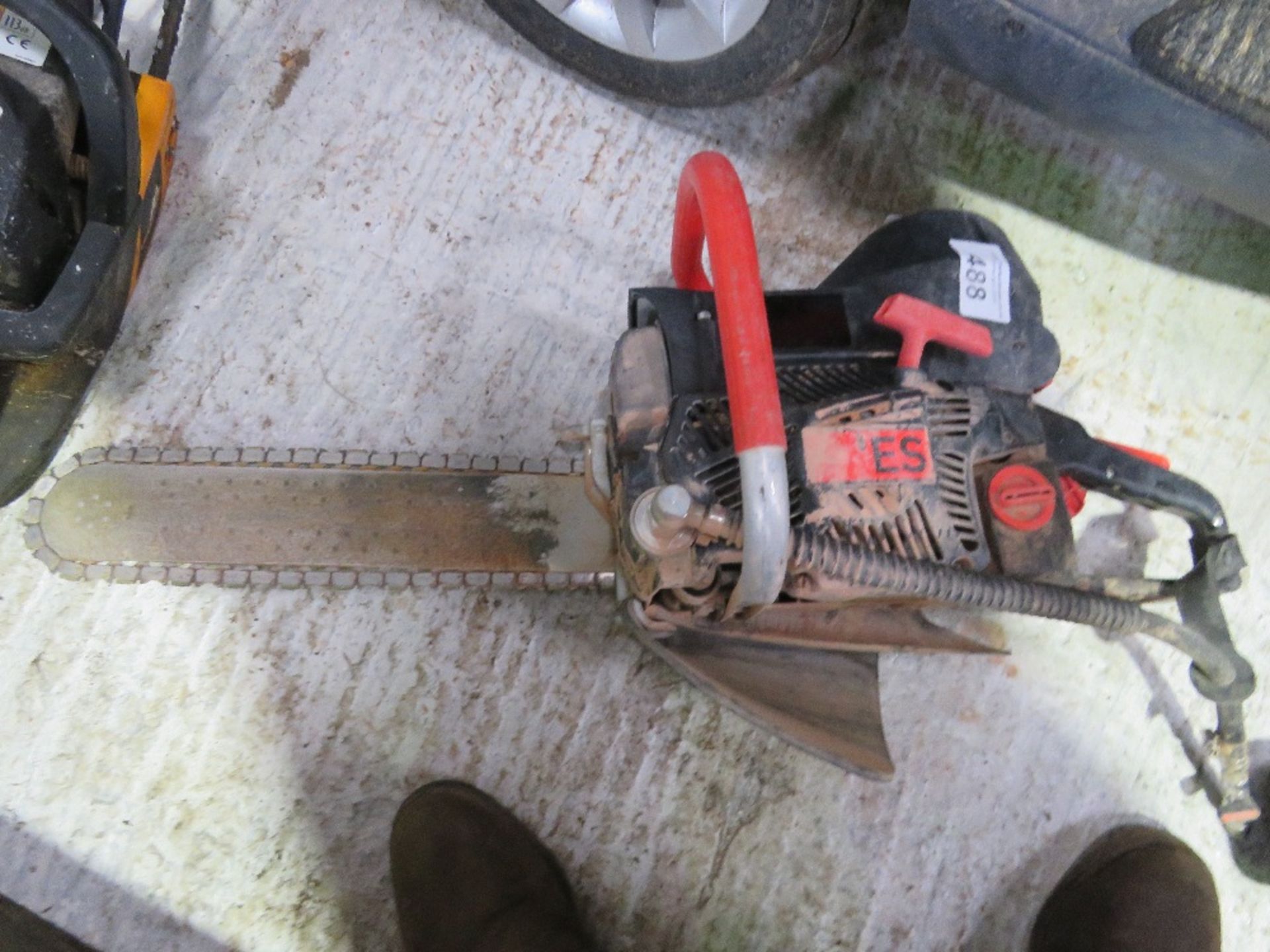 ES PETROL ENGINED BRICK CUTTING CHAINSAW.