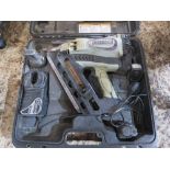 HITACHI NAIL GUN IN A CASE.