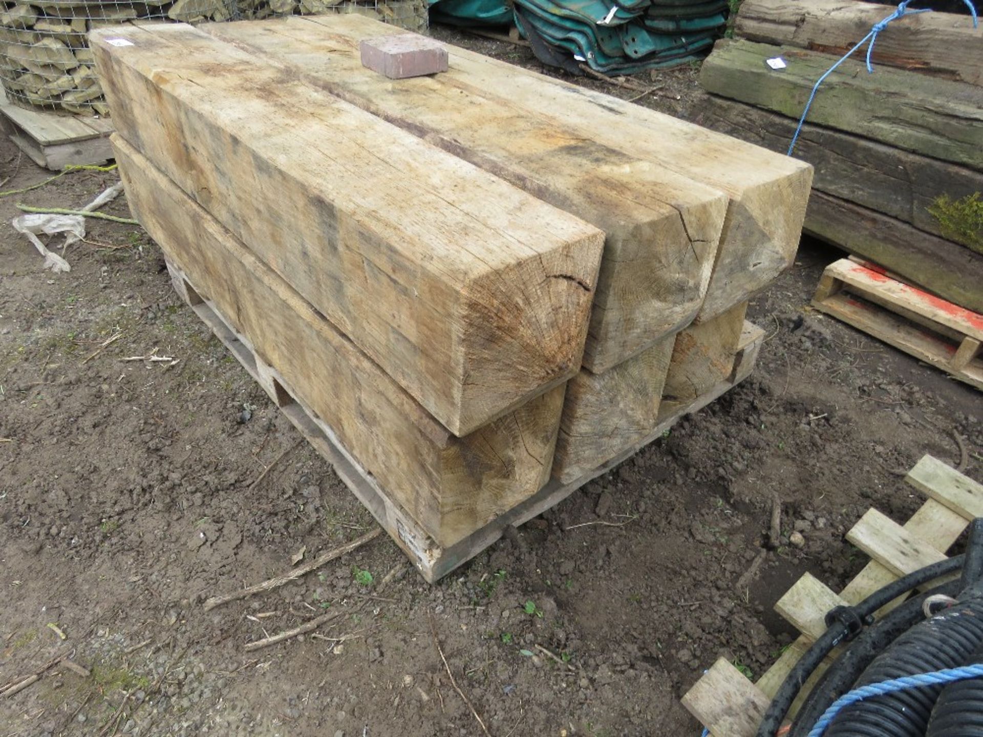 6NO HEAVY DUTY OAK BOLLARD POSTS 1.5M HEIGHT X 24CM X 24CM APPROX.....THIS LOT IS SOLD UNDER THE AUC