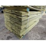 LARGE PACK OF PRESSURE TREATED HIT AND MISS TIMBER CLADDING BOARDS. 1.75M LENGTH X 100MM WIDTH APPRO