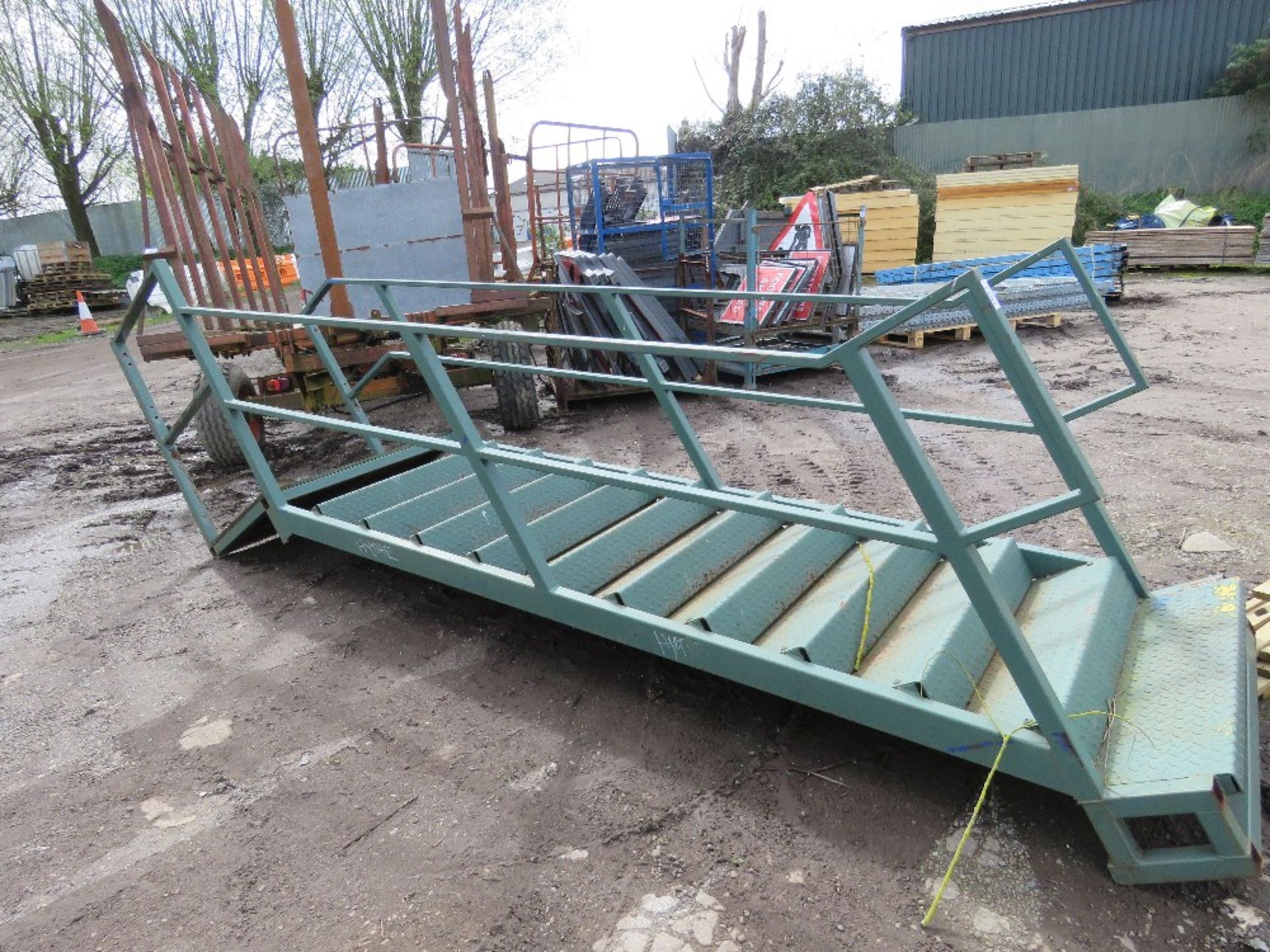 STEEL STAIRCASE FOR ACCESS TO PORTABLE OFFICE ETC. 13FT OVERALL LENGTH APPROX WITH A LANDING. 12 TRE