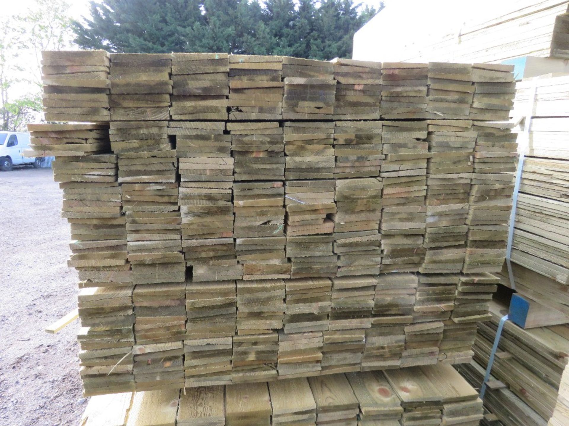 LARGE PACK OF PRESSURE TREATED FEATHER EDGE TIMBER CLADDING BOARDS. 1.80M LENGTH X 100MM WIDTH APPRO - Image 2 of 3