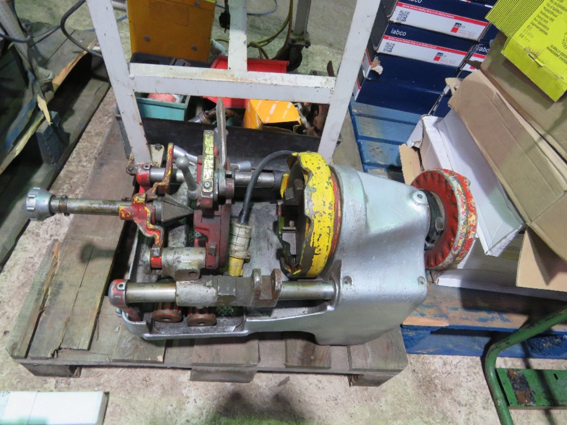 REX 110VOLT PIPE THREADER WITH TRANSFORMER, WHEELED TABLE AND TOOLING ETC AS SHOWN.....THIS LOT IS S - Image 2 of 9