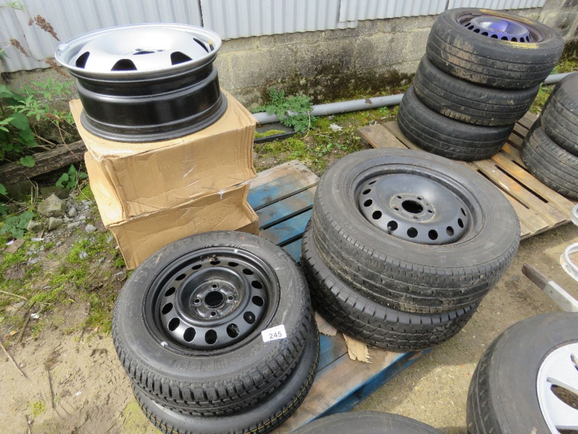 QUANTITY OF STEEL CAR RIMS AND WHEELS AS SHOWN.