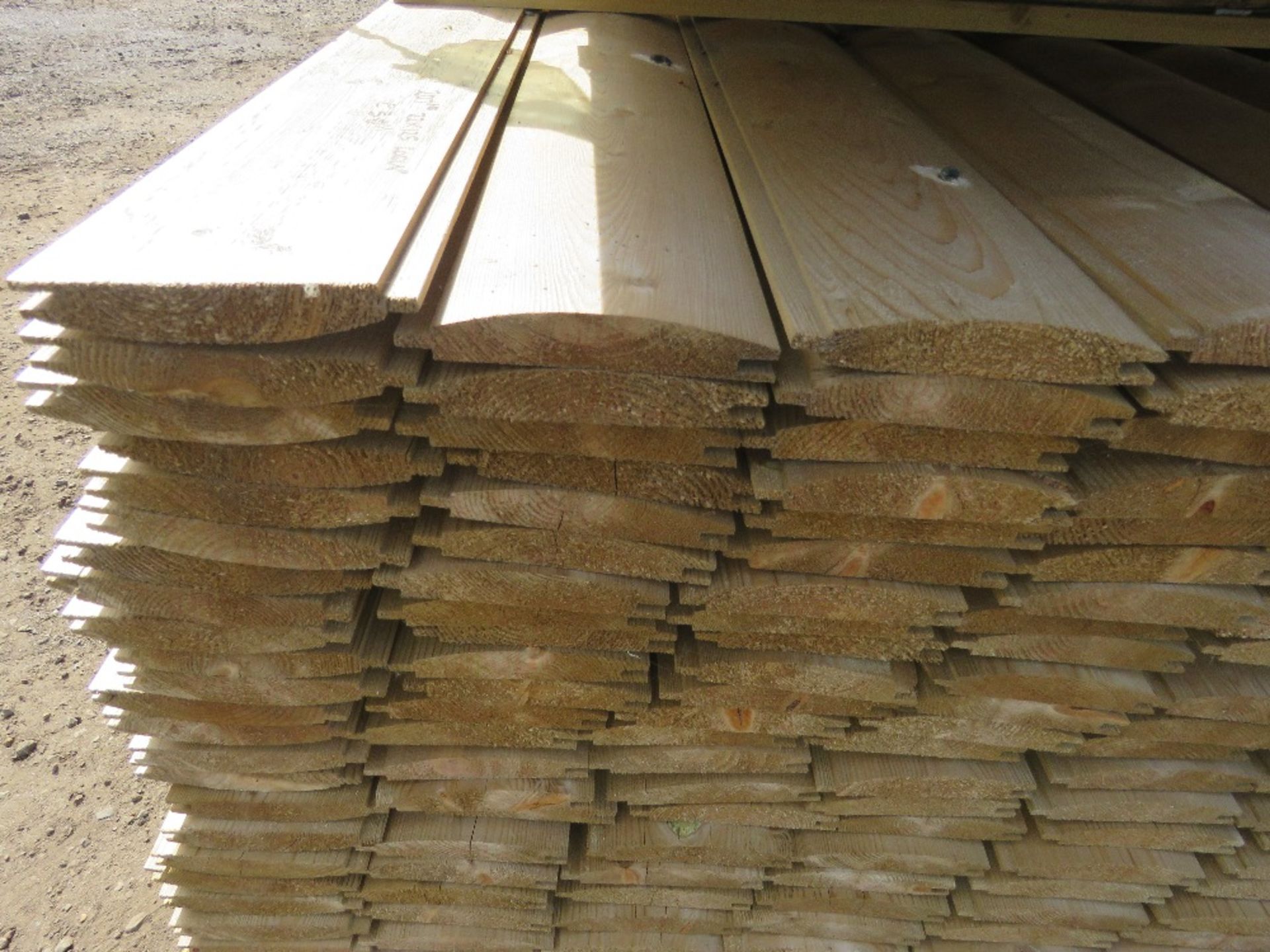LARGE PACK OF TREATED LOG LAP CLADDING BOARDS 22MM X 125MM @ 3M LENGTH APPROX. 207NO PIECES APPROX
